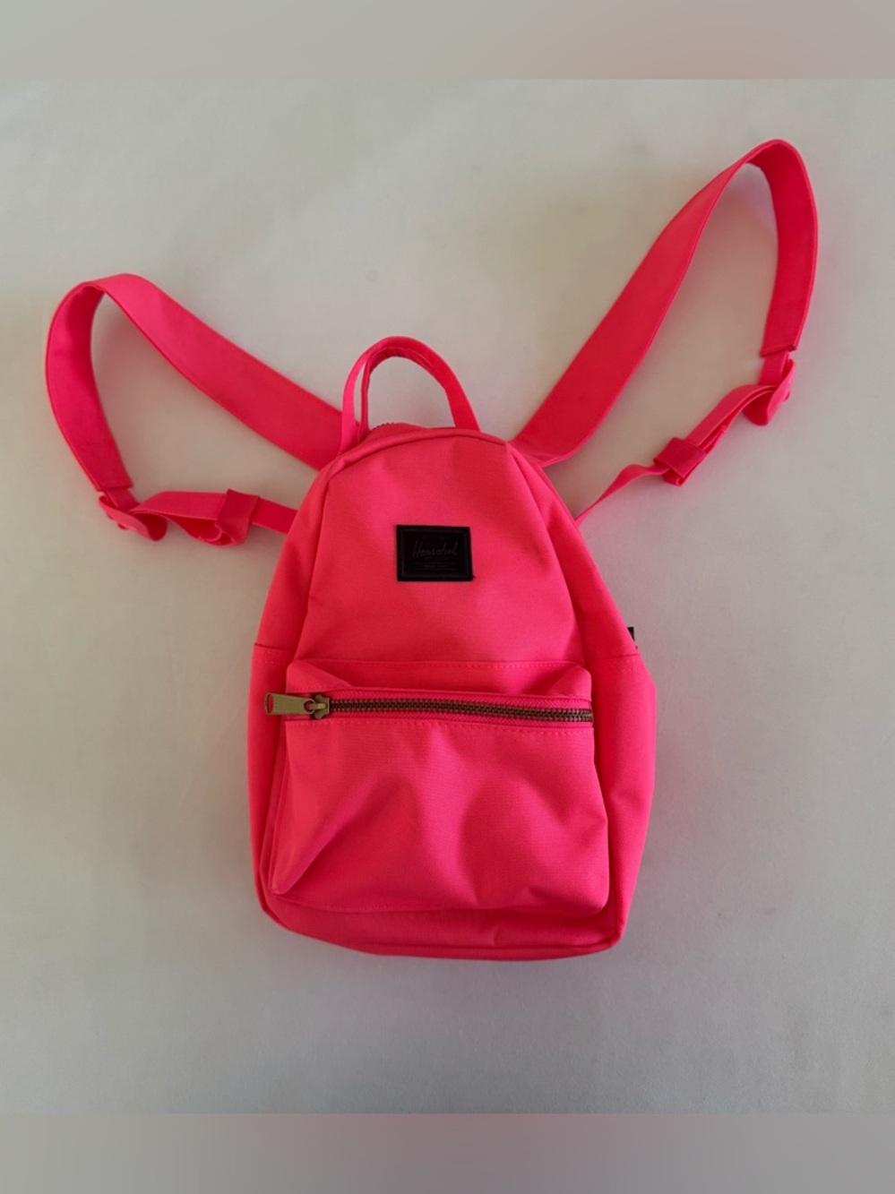 NWOT Herschel mini backpack. Bright salmon colored canvas w/heavy duty zippers.